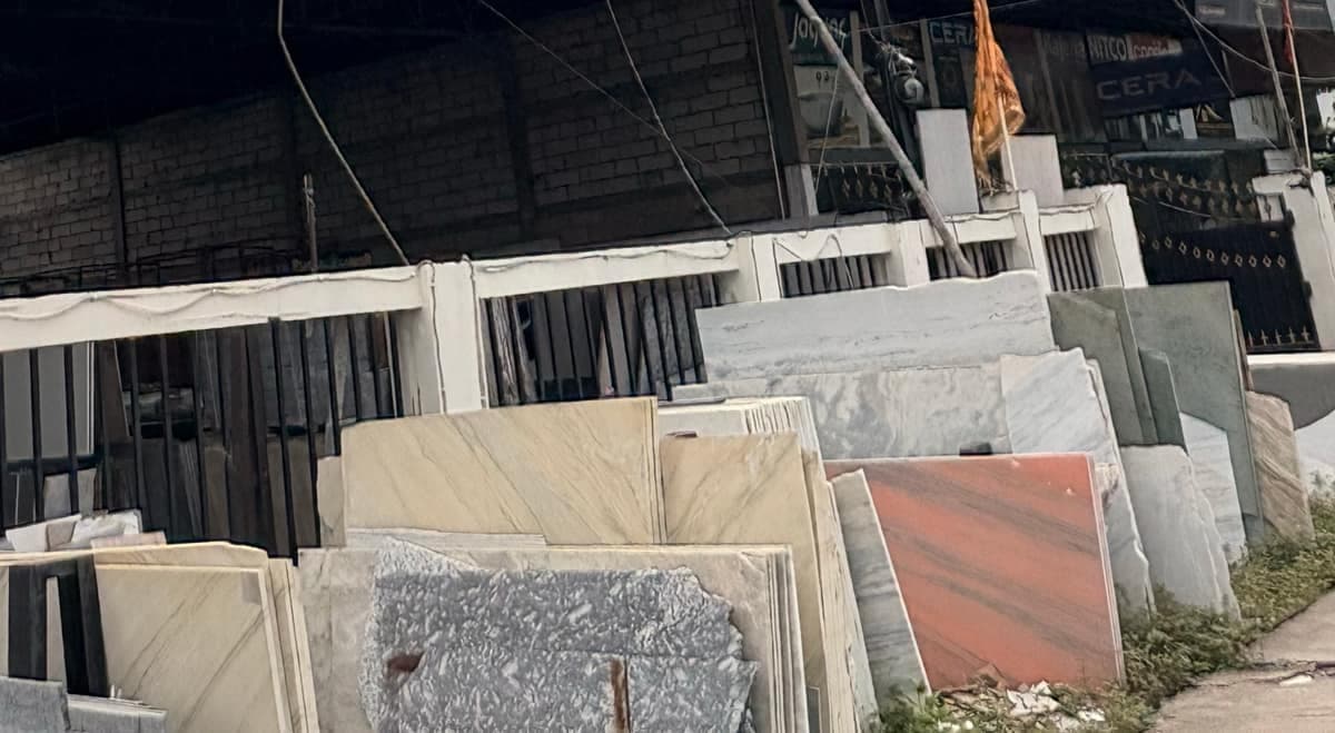 Marble and granite slabs standing along the frontage of the showroom